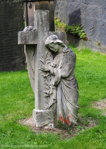 Grieving Woman and Cross
